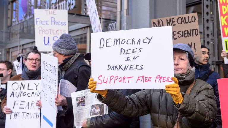 Protesters rally outside the New York Times building in midtown Manhattan for the March for a Free Press on Feb. 26, 2017.