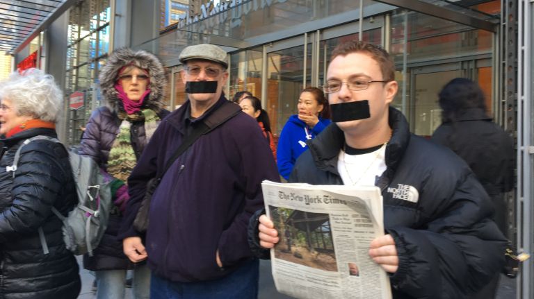 Protesters gather outside the New York Times building in midtown Manhattan for the March for a Free Press on Feb. 26, 2017.