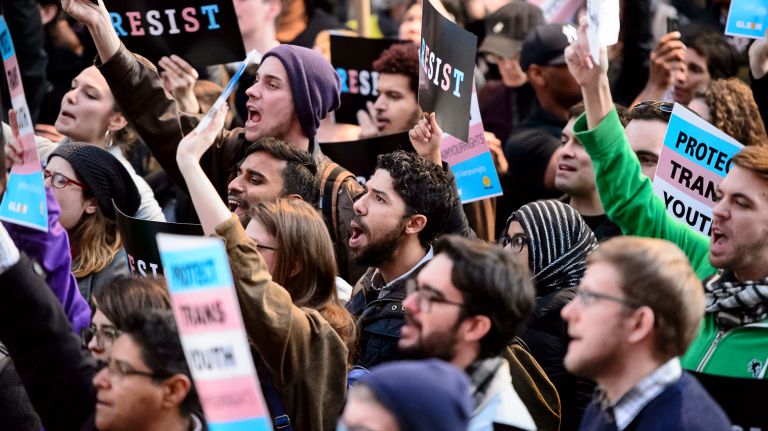 The crowd chants in response to speakers at a rally in support of transgender youth at the Stonewall National Monument in Greenwich Village on Feb. 23, 2017.