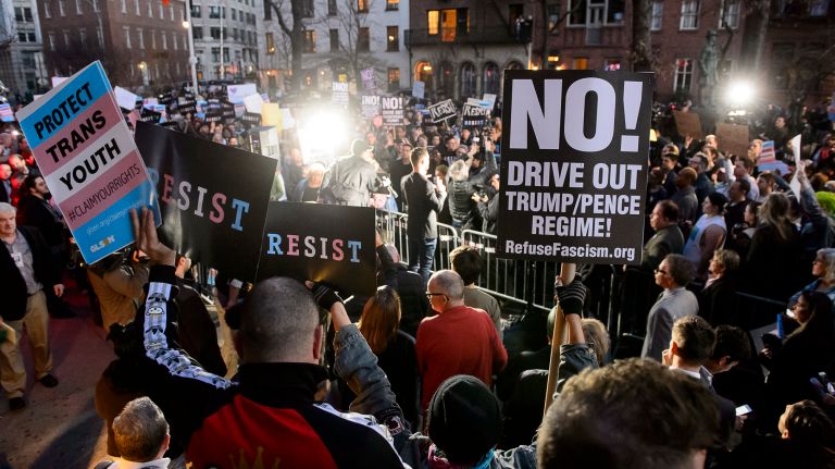LGBTQ activists attend a rally in support of transgender youth at the Stonewall National Monument in Greenwich Village on Feb. 23, 2017.