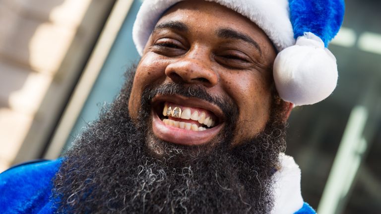 Cemal Williams, 40, from Jamaica, Queens, ditched the traditional red suit during SantaCon in Manhattan on Dec. 10, 2016.