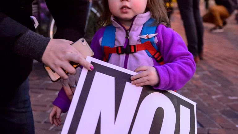 Jolie English, 2, attends a rally in support of transgender youth at the Stonewall National Monument in Greenwich Village on Feb. 23, 2017. 