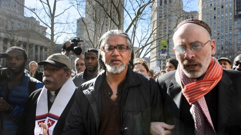 Ravi Ragbir ordered released from ICE detention by federal judge 1 Ravi Ragbir, center, executive director of the New Sanctuary Coalition, has been ordered released from ICE dentention.