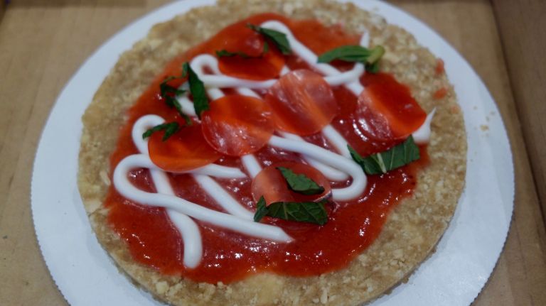 Pop-Tarts Café debuts with pizza, tacos and more in Times Square 11 It's no Di Fara, but the Pop-Tarts homage to New York's favorite food features a Brown Sugar Cinnamon Pop-Tart crust, strawberry sauce instead of marinara, frosting to look like cheese, fruit leather