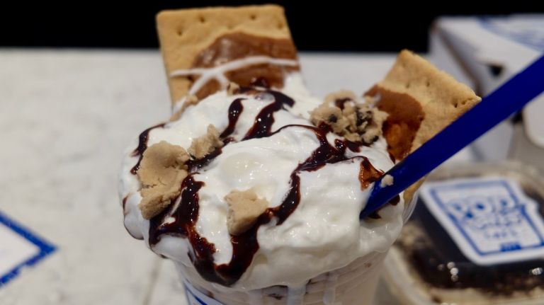 Pop-Tarts Café debuts with pizza, tacos and more in Times Square 12 This cutely named shake includes vanilla ice cream, cookie dough, milk, whipped cream, and Chocolate Chip Cookie Dough Pop-Tarts -- both on top and blended into the shake. This shake and five other flavors cost $12.