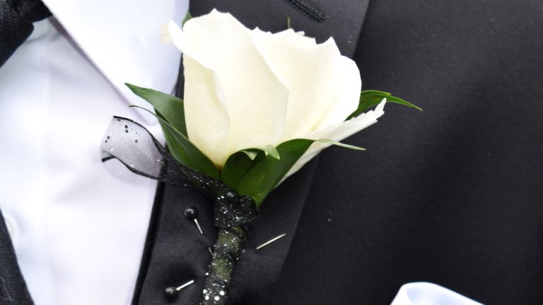 The Grammys red carpet might be flooded with celebrities wearing white roses come Sunday. 