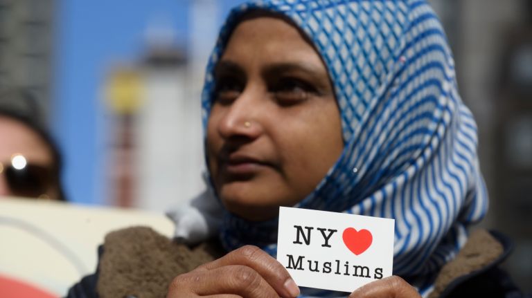 A woman attends the I Am A Muslim Too rally in Times Square on Feb. 19, 2017.