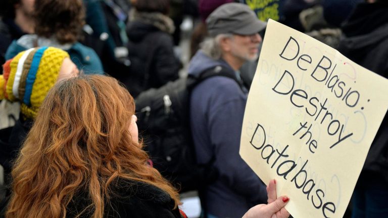 A protester has a message for Mayor de Blasio during a rally at Washington Square Park on Saturday, Feb. 11, 2017. The rally is being held to challenge the criminalization of immigrants under the NYPD's current Broken Windows policy, before it worsens under President Trump's far-right administration.