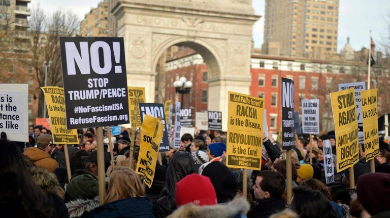 Thousands rally for immigrant rights at Washington Square Park on Saturday, Feb. 11, 2017. The rally was held to challenge the criminalization of immigrants under the NYPD's current Broken Windows policy, before it worsens under President Trump's far-right administration.