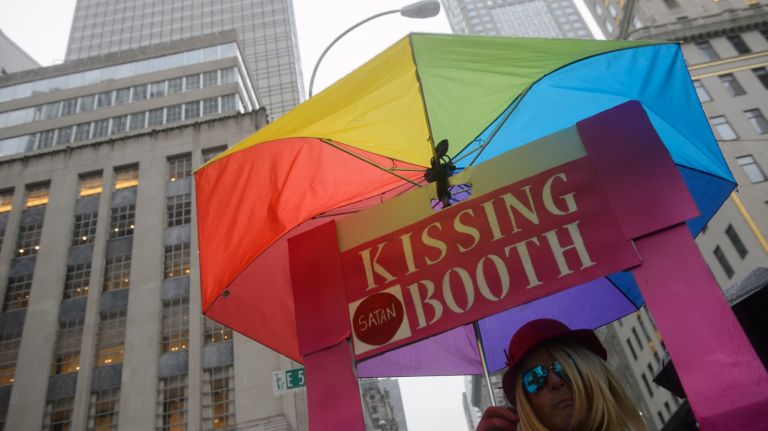 LGBT rally at Trump Tower: Photos of the midtown Manhattan protest 37 Mike Hisey, 54, came to the rally donning a Kellyanne Conway Inauguration Day-inspired red, white and blue coat and a makeshift kissing booth on Sunday, Feb. 12, 2017.