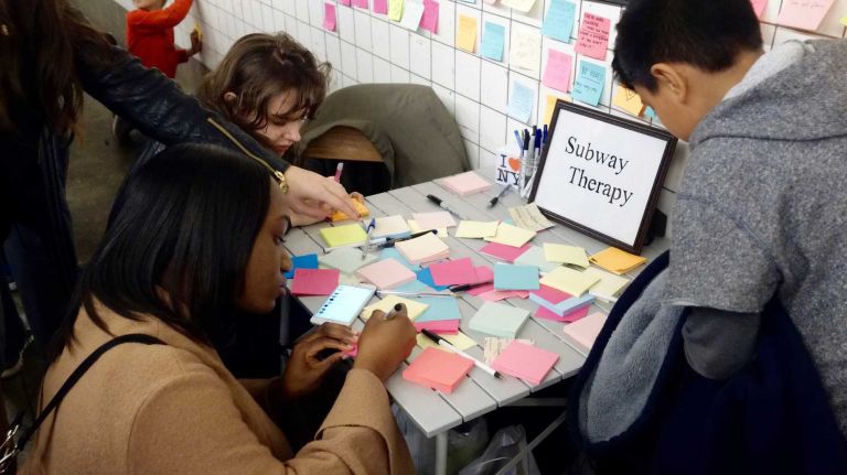More commuters jotting down their feelings.