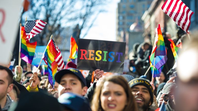 People protest at a rally in front of the Stonewall Inn in solidarity with immigrants, asylum seekers, refugees and the LGBT community on Saturday, Feb. 4, 2017, in Manhattan. 