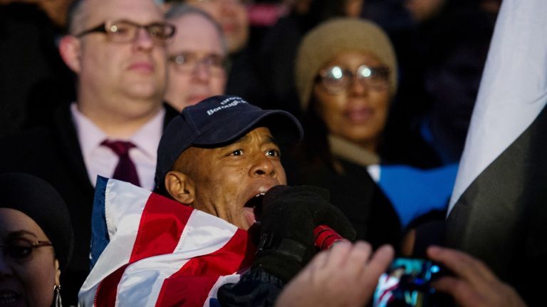 Brooklyn Borough President Eric Adams speaks to the crowd as the Yemeni-American community rallies at Brooklyn Borough Hall against President Donald Trump's immigration travel ban on Feb. 2, 2017.