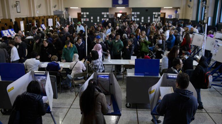 Voters cast their ballots at St. Sebastian's School in Woodside, Queens, on Nov. 8, 2016.
