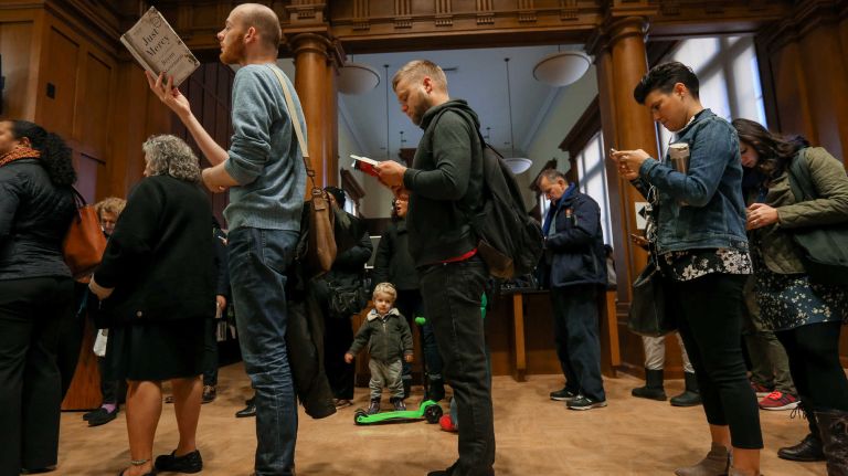 Voters wait on line to cast their ballots at the Brooklyn Public Library's Park Slope branch on Sixth Avenue on Nov. 8, 2016.
