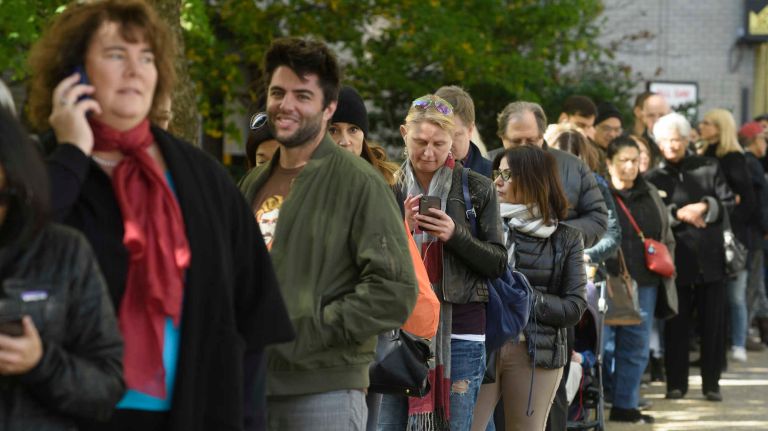 Voters wait in a long line on East 89th Street to cast their ballots at Yorkville Community School on East 88th Street in Manhattan on Nov. 8, 2016.