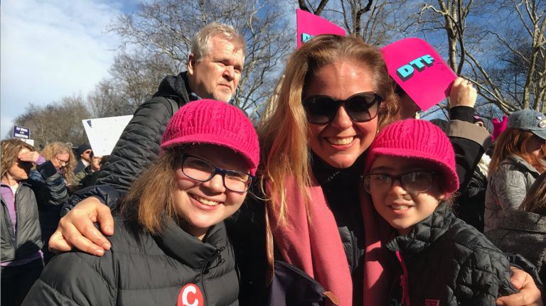 The Women's March on New York City  drew not only adults, but kids like Leila  Mckiernan, left,  and Ella Mckiernan, right, both sporting bright pink hats for the occasion.