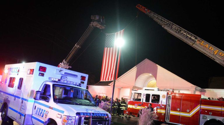 Bronx police shooting: Photos from the scene and more 26 Police officers and firefighters at the Chapey & Sons Funeral Home in Bethpage on Saturday, Nov. 5, 2016. Sgt. Paul Tuozzolo's body was transported to the funeral home from New York City by ambulance.