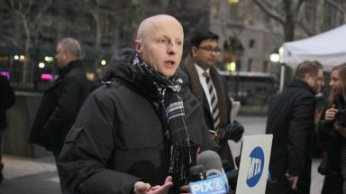 Andy Byford, the new MTA transit president, speaks to reporters outside of MTA headquarters in Manhattan before starting his first day on the job on Tuesday, Jan. 16, 2018.