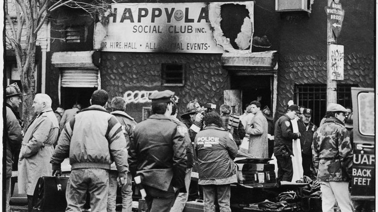 The scene outside Happy Land Social Club, at 1959 Southern Blvd. in the Bronx, on March 25, 1990. Earlier that day, 87 people were trapped inside the club and died after an arsonist, Julio Gonzalez, set fire to the building as an act of revenge against an ex-girlfriend, police said.
