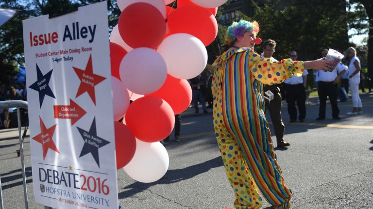 Presidential debate at Hofstra: Photos from the scene 33 A women dressed as a clown makes a statement about the media circus as she hands out candy at the entrance to Issue Alley on the campus of Hofstra University on Sept. 26, 2016