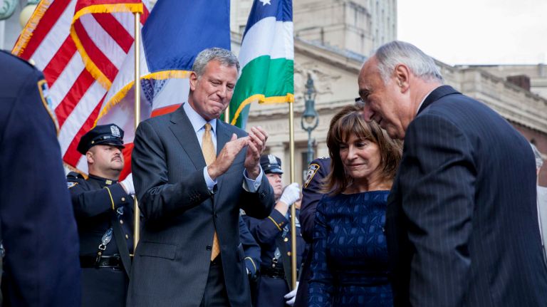 Mayor Bill de Blasio shakes hands with retired Police Commissioner Bill Bratton as he leaves 1 Police Plaza on Sept. 16, 2016.