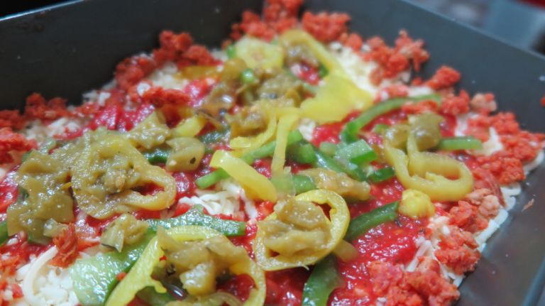 See the crumbled pepperoni?