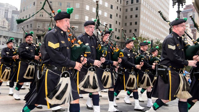Pipers march in the parade to honor NYPD officers who died in the 9/11 terror attacks, on Friday, Sept. 9, 2016.