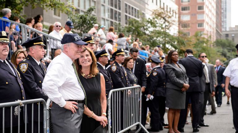 NYPD Commissioner William Bratton and his wife Rikki Klieman view the parade and ceremony to honor NYPD officers who died in the 9/11 terror attacks, on Friday, Sept. 9, 2016.
