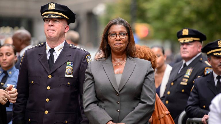 NYPD Chief of Department James O'Neill and Public Advocate Letitia James watch the parade and ceremony on Friday, Sept. 9, 2016, to honor NYPD officers who died in the 9/11 terror attacks.