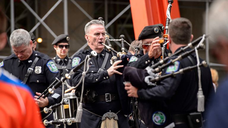 Bagpipers tune up before the parade and ceremony on Friday, Sept. 9, 2016, to honor NYPD officers who died in the 9/11 terror attacks.