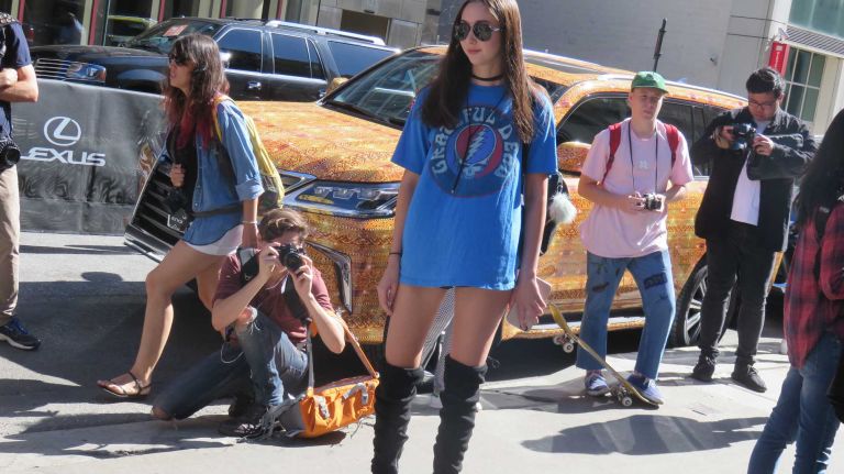 A guest shows off her street style outside the Vera Wang show at the Skylight at Moynihan Station in Manhattan during New York Fashion Week on Tuesday, Sept. 13, 2016.