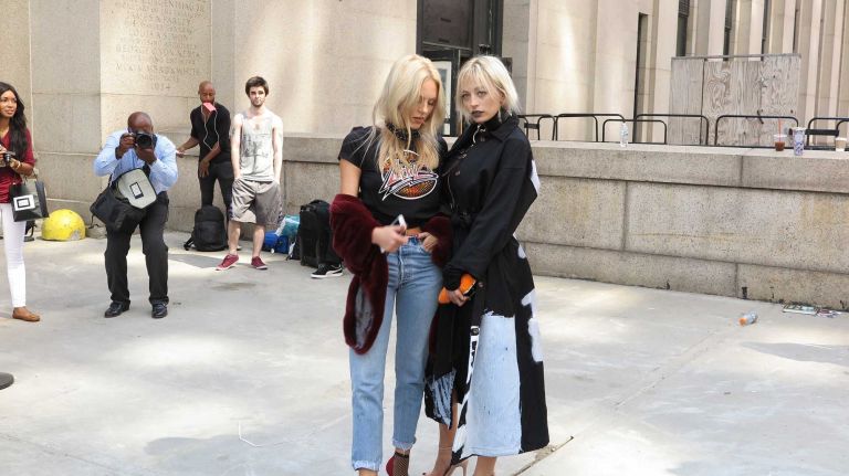 Shea Marie, left, and Caroline Vreeland, right, show off their best friend street style outside the Michael Costello show during New York Fashion Week at the Skylight at Moynihan Station in Manhattan on Thursday, Sept. 8, 2016.