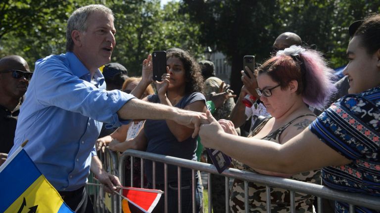 West Indian Day Parade: Photos from the Crown Heights celebration 31 Politicians like Mayor Bill de Blasio made appearances, shaking hands as they marched.