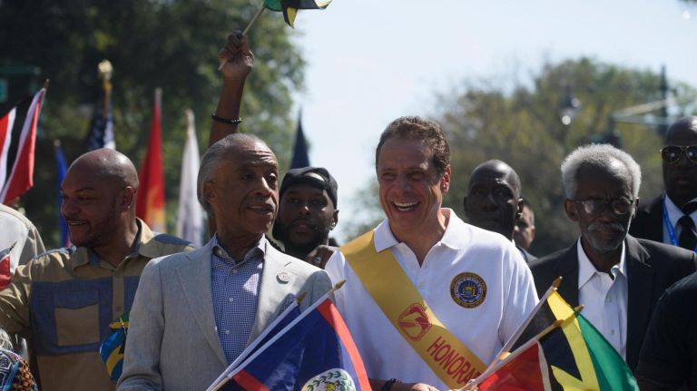 West Indian Day Parade: Photos from the Crown Heights celebration 32 Gov. Andrew Cuomo (pictured right) was there, too, marching alongside the Reverend Al Sharpton.