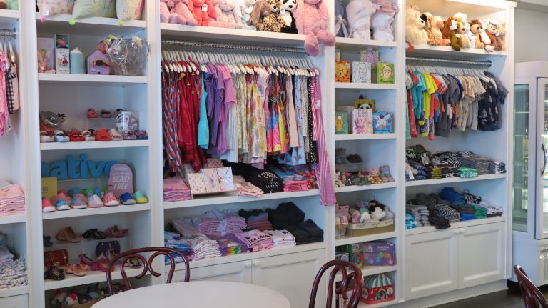 A La Mode Shoppe makes ice cream accessible to all with nut-free, egg-free ingredients 12 Owner Sandy Roth curates the children's boutique inside the parlor.