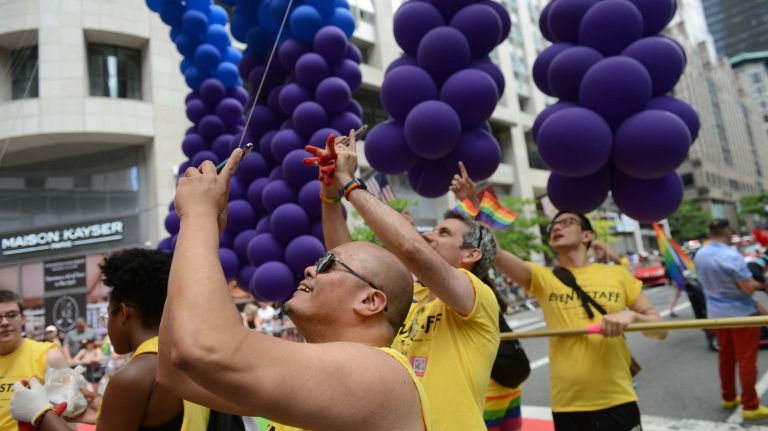 Thousands march down Fifth Avenue during New York City's annual LGBTQ Pride March on Sunday, June 25, 2017.