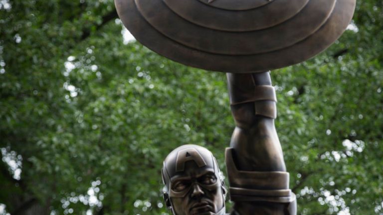 The bronze Captain America statue is 13 feet tall, towering into the trees of Prospect Park on Aug. 10, 2016. It also will be on exhibit later at Barclays Center and in Liberty View Industrial Plaza.