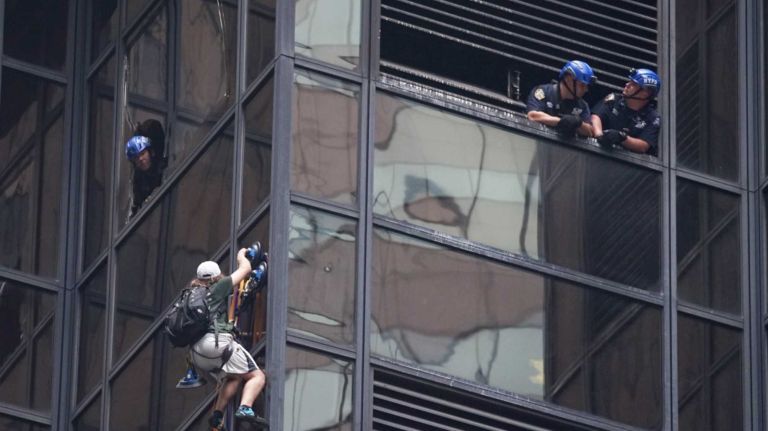 Police respond Wednesday afternoon when a man was scaling Trump Tower on Fifth Avenue on Aug. 10, 2016.