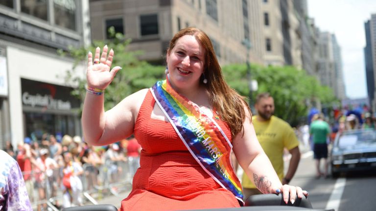 Grand Marshal Brooke Guinan, the first openly transgender NYC firefighter, leads thousands in a march down Fifth Avenue during New York City's annual LGBTQ Pride March on Sunday, June 25, 2017.