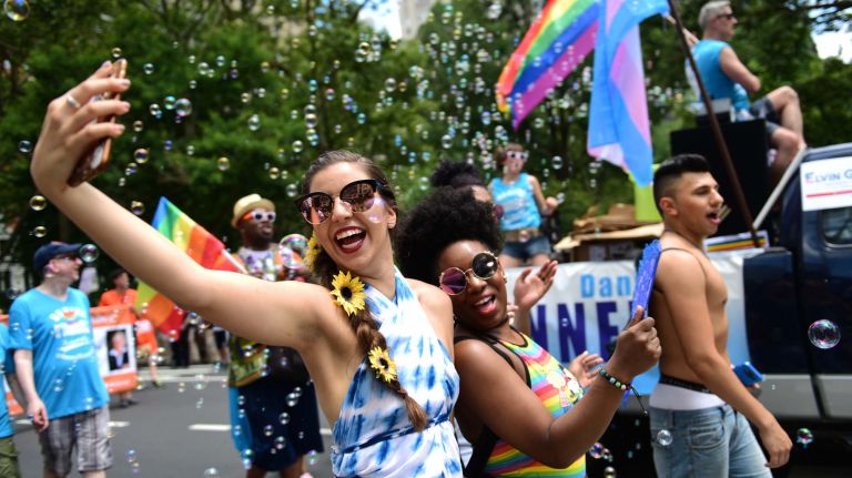 Thousands march down Fifth Avenue during New York City's annual LGBTQ Pride March on Sunday, June 25, 2017.
