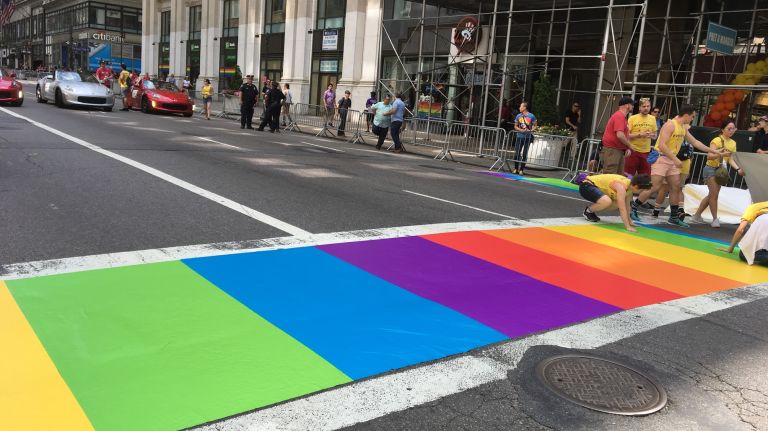 A rainbow crosswalk is set up ahead of the annual NYC Pride March on Fifth Avenue in Manhattan on Sunday, June 25, 2017.