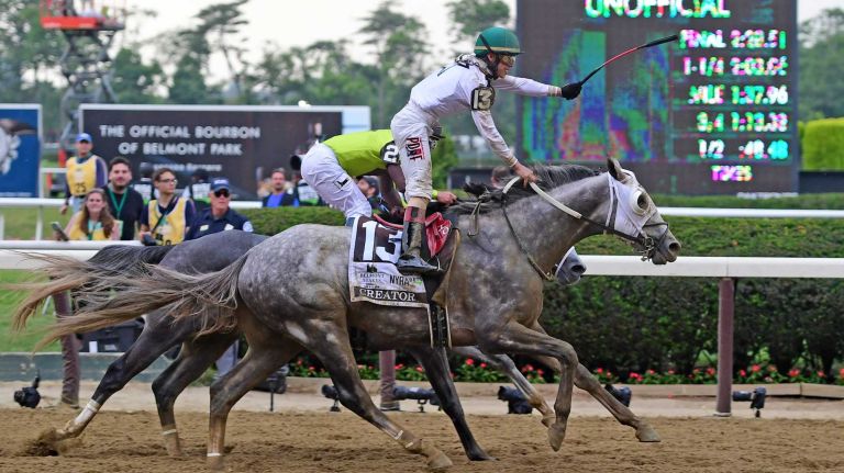 Creator (13) edges out Destin (2) to win the 148th running of the Belmont Stakes at Belmont Park in Elmont on June 11, 2016.