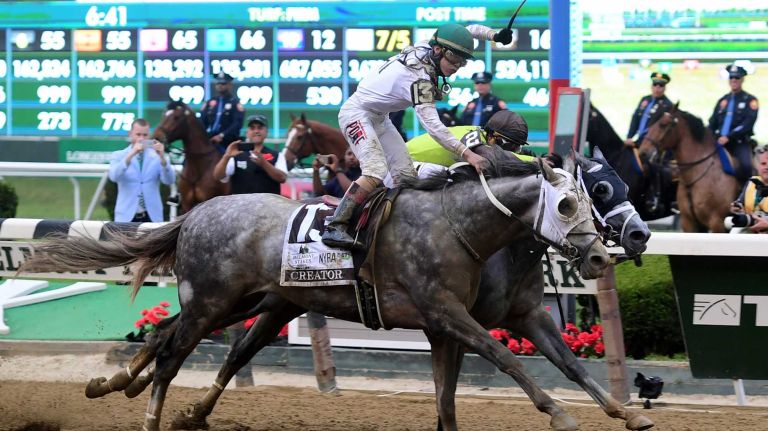 Creator (13) edges out Destin (2) to win the 148th running of the Belmont Stakes at Belmont Park in Elmont on June 11, 2016.