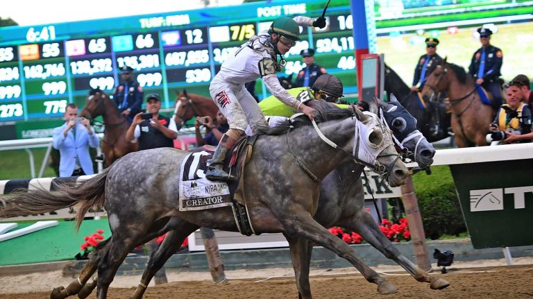 Creator (13) edges out Destin (2) to win the 148th running of the Belmont Stakes at Belmont Park in Elmont on June 11, 2016.
