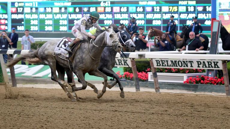 Creator (13) edges out Destin (2) to win the 148th running of the Belmont Stakes at Belmont Park in Elmont on June 11, 2016.