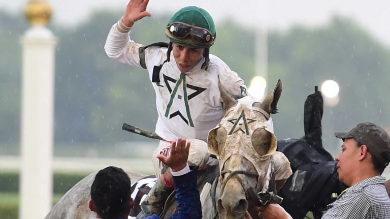 Irad Ortiz Jr. on Creator (13) is congratulated after winning the 148th running of the Belmont Stakes at Belmont Park in Elmont on June 11, 2016.