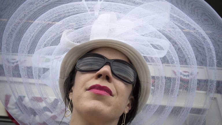 Jill Faltiano, of Morristown, N.J., wears a gauzy hat on June 11, 2016, for the frestivities preceding the running of the 148th Belmont Stakes at Belmont Park in Elmont.