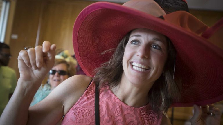 Kerry Fischer, of Casper, Wyo., shows her hat on Saturday, June 11, 2016, during festivities before the running of the 148th Belmont Stakes at Belmont Park in Elmont.