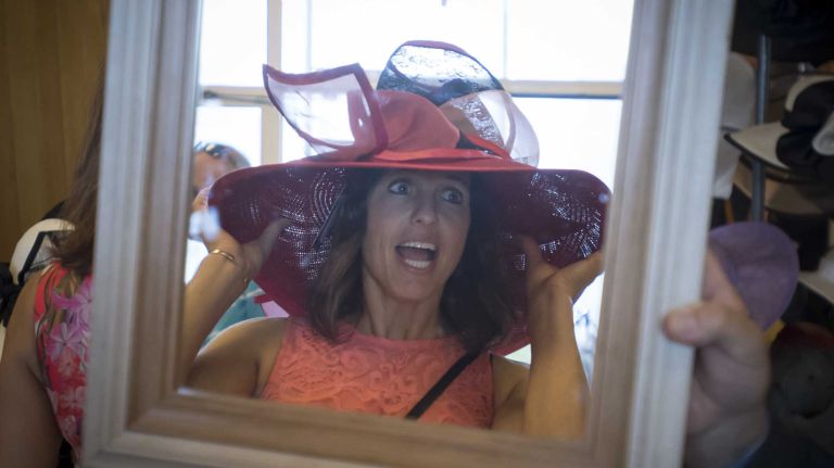 Kerry Fischer, of Casper, Wyo., shows her hat on Saturday, June 11, 2016, during festivities before the running of the 148th Belmont Stakes at Belmont Park in Elmont.